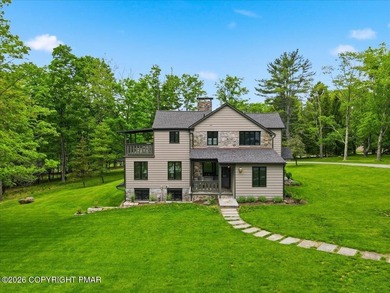 This elegant home is beautifully nestled on 1.5 acres high on - photo 5