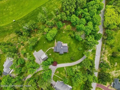 This elegant home is beautifully nestled on 1.5 acres high on - photo 6