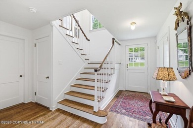This elegant home is beautifully nestled on 1.5 acres high on - photo 9
