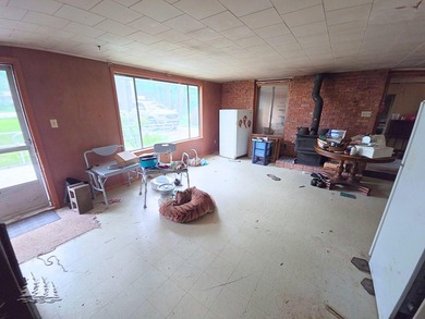Sold AS IS, this 2-bedroom, 660 sq. ft. home in Johnson - photo 5