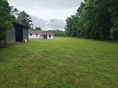 Country living home located on the Ouachita River. Located at - photo 4