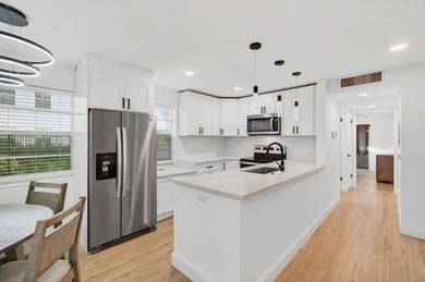 Completely Renovated 2/2 Ground-Floor Condo in Kings Point! - photo 1