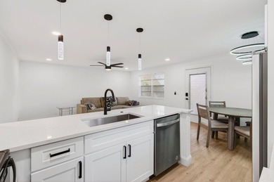 Completely Renovated 2/2 Ground-Floor Condo in Kings Point! - photo 6
