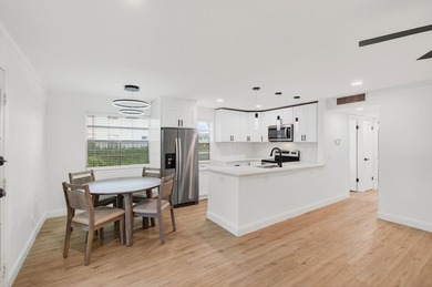 Completely Renovated 2/2 Ground-Floor Condo in Kings Point! - photo 10
