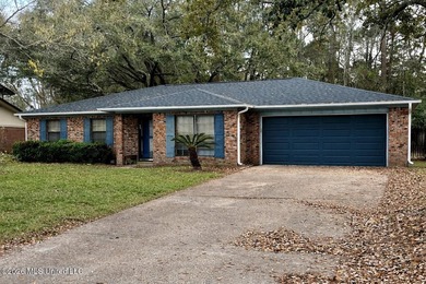 This well-maintained brick home offers a functional layout with - photo 1