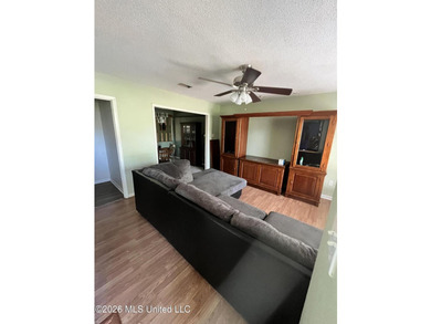 This well-maintained brick home offers a functional layout with - photo 5