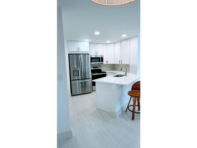 Completely remodeled and move-in ready! This beautiful 2-bedroom - photo 2