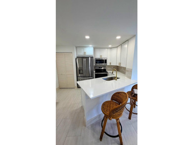 Completely remodeled and move-in ready! This beautiful 2-bedroom - photo 4