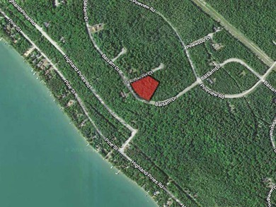 Private wooded lot in the Presque Isle Harbor association with - photo 1