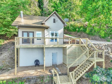 Smith Lake (Ryan Creek) A 3BR/2BA cottage ideally situated on - Lake Home For Sale in Bremen, Alabama