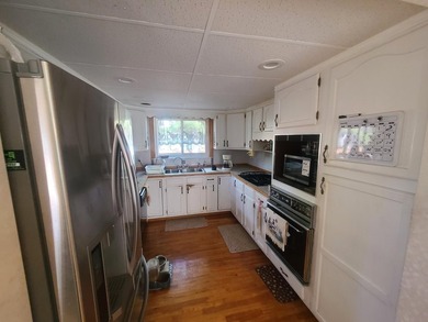 Take a look at this 3 bedroom 2 1/2 bath home. Sitting on just - photo 5
