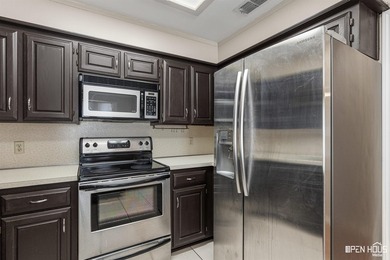Welcome to this charming 3-bedroom, 2-bath home in the highly - photo 13