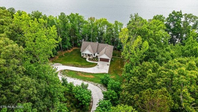 Lakefront home situated on over an acre in a serene wooded - photo 34