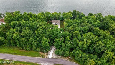 Lakefront home situated on over an acre in a serene wooded - photo 35
