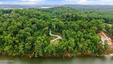 Lakefront home situated on over an acre in a serene wooded - photo 36