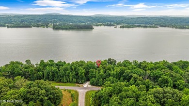 Lakefront home situated on over an acre in a serene wooded - photo 37