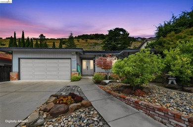 Welcome to this impeccably remodeled home in the highly - photo 2