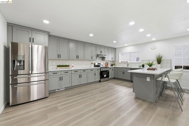 Welcome to this impeccably remodeled home in the highly - photo 7