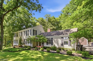 Welcome to this custom built center hall colonial located in the - photo 1