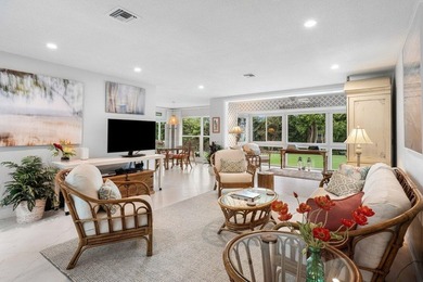 Beautifully renovated 2 bedroom Corner 2nd floor condo with Golf - photo 1