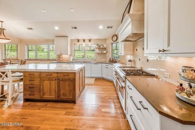 Welcome home to the coveted Eagle Ranch community, where - photo 12