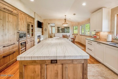 Welcome home to the coveted Eagle Ranch community, where - photo 13