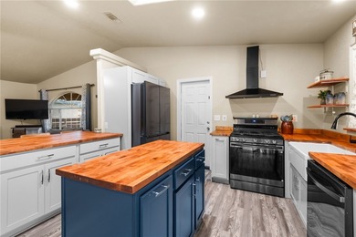 This updated 3 bedroom, 2 bathroom home offers an open layout