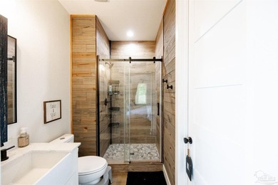 Home on a stunning 1.77-acre lot, this professionally designed - photo 22