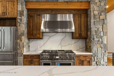 Stunning custom home with sweeping treetop and mountain views - photo 11