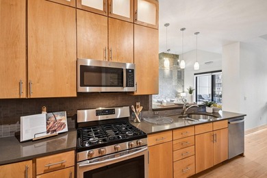 Step into effortless downtown living in this beautifully - photo 11