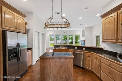 Stunning all-brick waterfront home on an expansive corner lot - photo 12