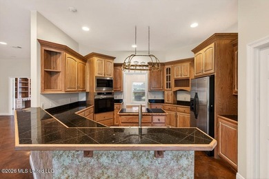 Stunning all-brick waterfront home on an expansive corner lot - photo 14