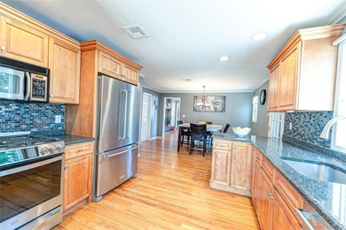 Stunning water views! This 4 bedroom, 2 full bath Colonial is - photo 16