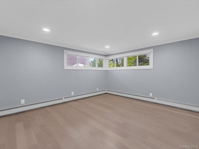 Welcome to this fully renovated ranch-style residence in the - photo 16