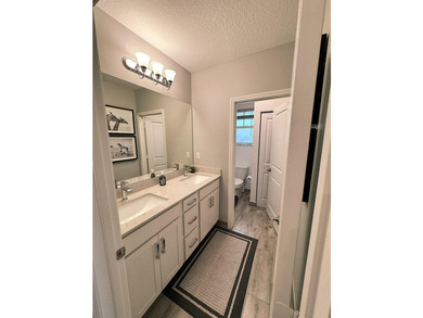 Welcome to this beautifully maintained two-story waterfront home - photo 17