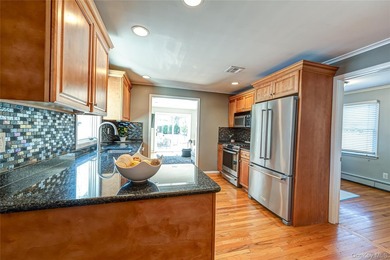 Stunning water views! This 4 bedroom, 2 full bath Colonial is - photo 18