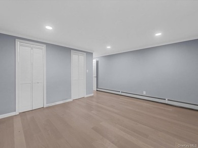 Welcome to this fully renovated ranch-style residence in the - photo 18