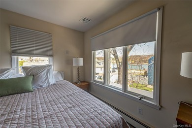Stunning water views! This 4 bedroom, 2 full bath Colonial is - photo 22