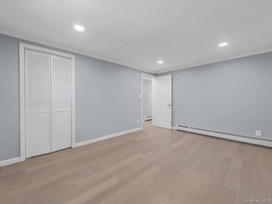 Welcome to this fully renovated ranch-style residence in the - photo 22