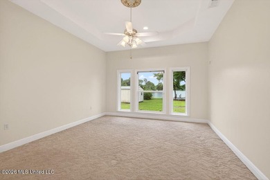 Stunning all-brick waterfront home on an expansive corner lot - photo 23