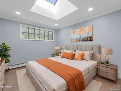Welcome to this fully renovated ranch-style residence in the - photo 24