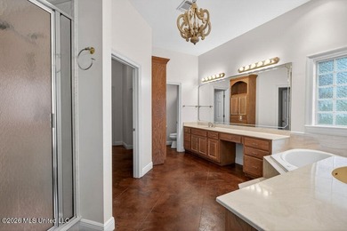 Stunning all-brick waterfront home on an expansive corner lot - photo 26