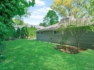 Welcome to this fully renovated ranch-style residence in the - photo 31