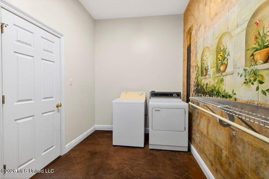 Stunning all-brick waterfront home on an expansive corner lot - photo 34