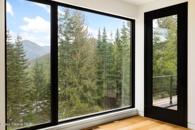 Stunning custom home with sweeping treetop and mountain views - photo 36