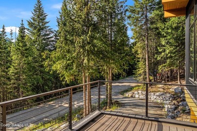 Stunning custom home with sweeping treetop and mountain views - photo 38