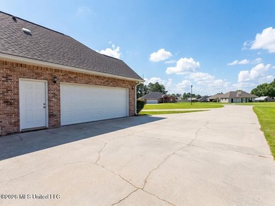 Stunning all-brick waterfront home on an expansive corner lot - photo 38