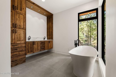 Stunning custom home with sweeping treetop and mountain views - photo 39