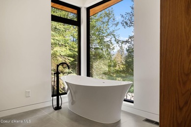 Stunning custom home with sweeping treetop and mountain views - photo 40