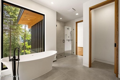 Stunning custom home with sweeping treetop and mountain views - photo 41
